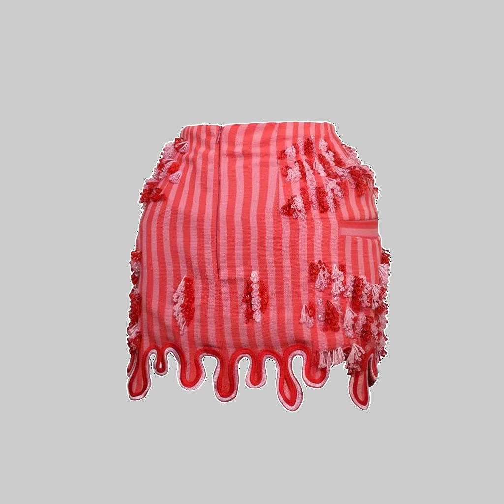 Red and white striped skirt with distressed details on a white background