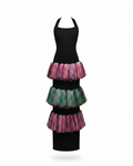 Black dress with colorful layered skirt on a white background