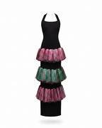 Black dress with colorful layered skirt on a white background