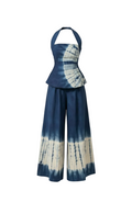 Tie-dye outfit with halter top and wide-leg pants on a white background